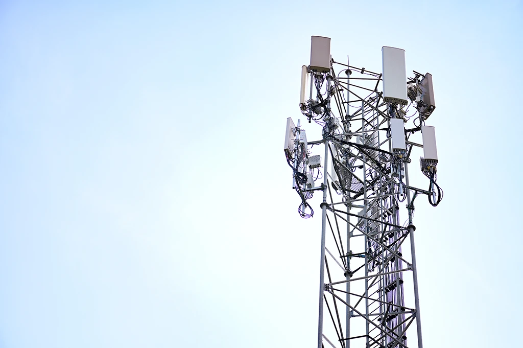 Cell tower with a clear blue sky